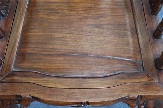 A pair of early 20th century Chinese Hongmu elbow chairs